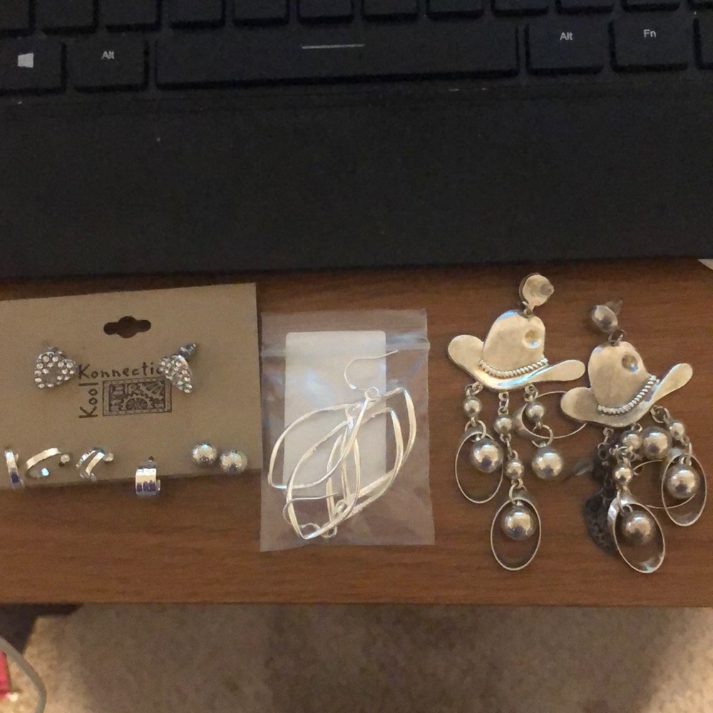 6 pairs of silver earrings